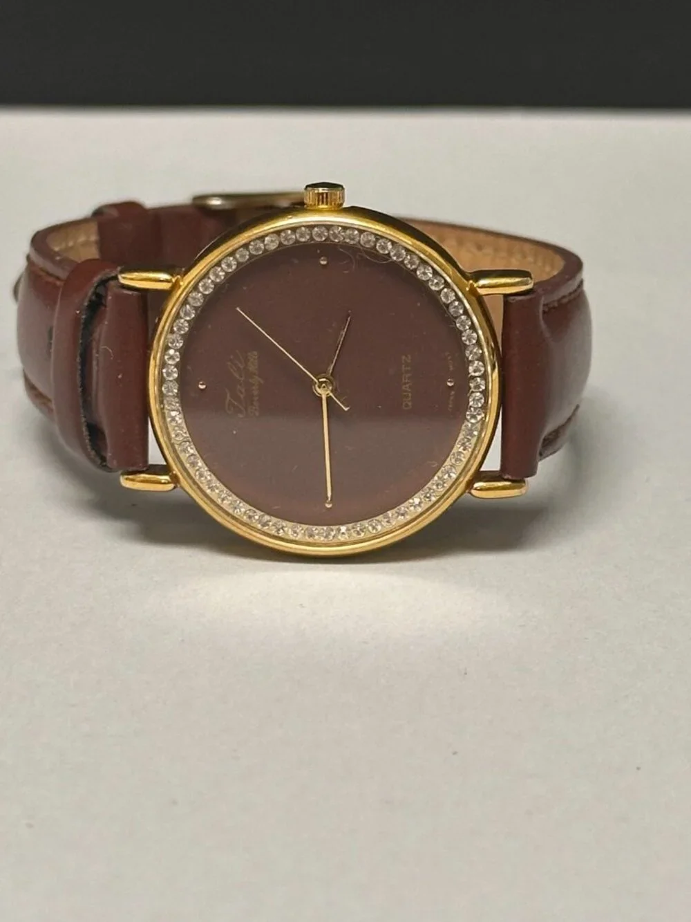 VTG. Tali Bevelry Hills Watch Women Gold Tone Brown Dial Leather Band 9